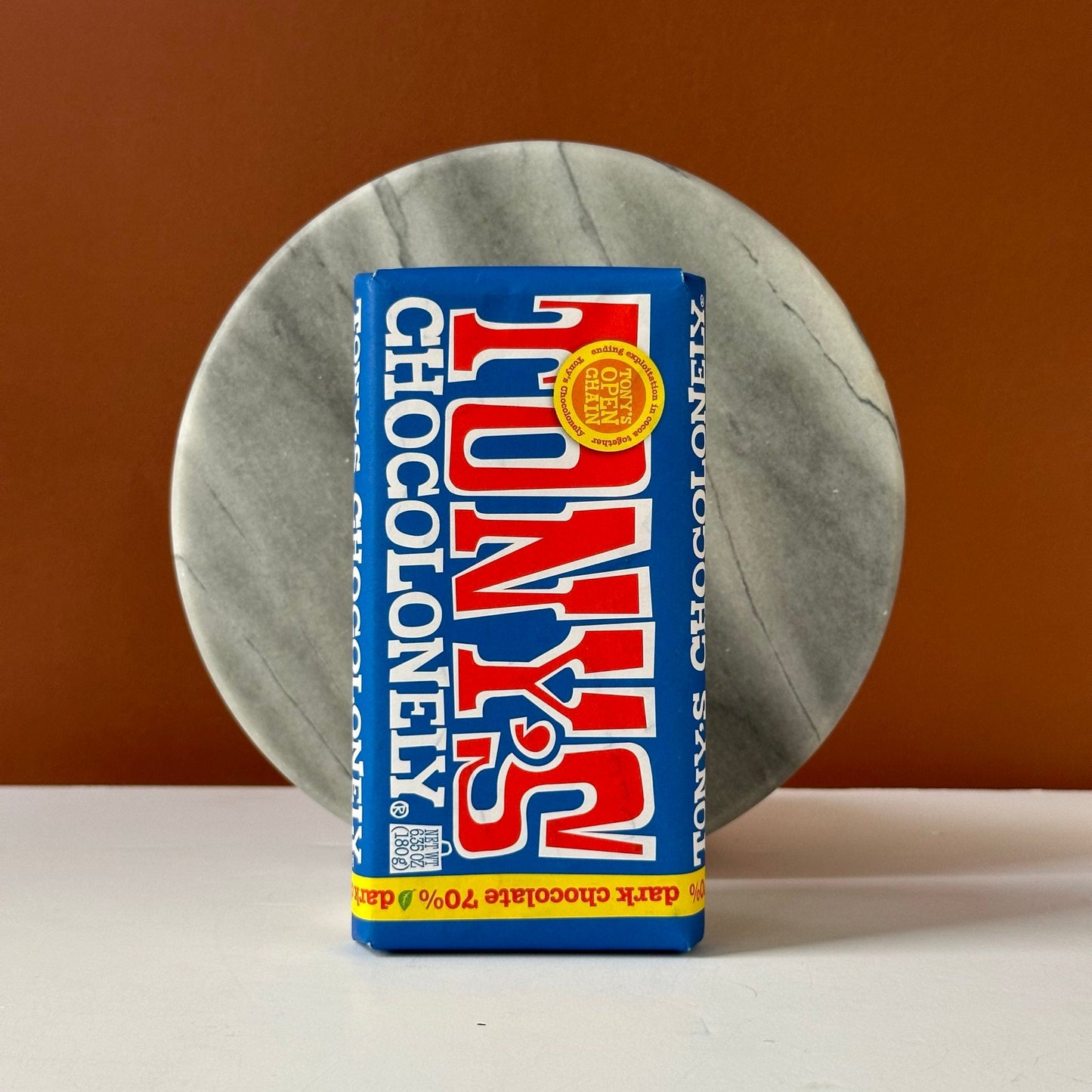 a large bar of Tony's Chocolonely Dark Chocolate 70%.